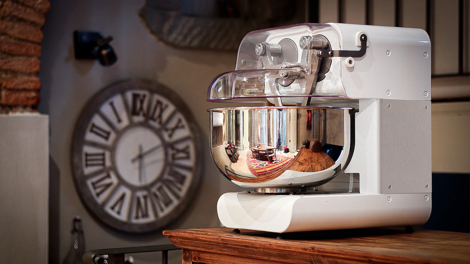 Miss Baker benchtop diving-arm mixer on a wooden table in an Italian kitchen
